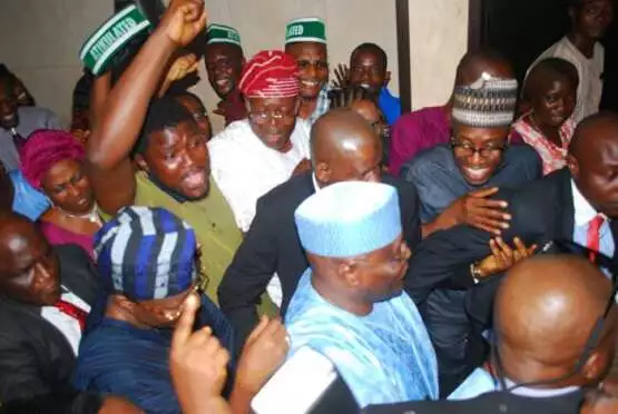 Atiku Abubakar (middle) being cheered by party supporters