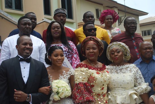 Nkechi Obi flanked by family members