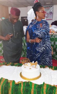 The celebrant, Mrs Lizzy Ihezue Iwuamadi, cutting her retirement cake with her husband, Barr. Emeka Iwuamadi