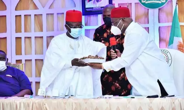  Imo State Governor, Senator Hope Uzodimma (right) presenting Kolanuts to the Chairman of South East Governor forum and Governor of Ebonyi, Engr Dave Umahi at the Meeting of Ohanaeze Ndigbo hosted by Governor Uzodimma at the Government House Bouquet Hall, Owerri