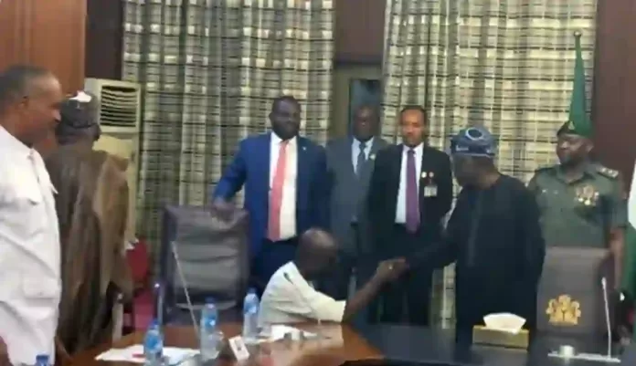Edo Governor-Elect Okpebolo kneels Before Tinubu