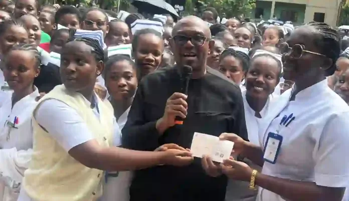 Peter Obi presenting Cheque