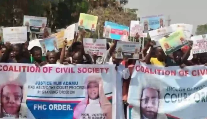Activists Protest Over Relocation Of Benue LG Election Tribunal To Abuja Activists Protest Over Relocation Of Benue LG Election Tribunal To Abuja