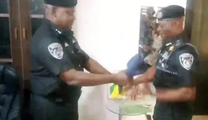 Wilfred Afolabi handing over to the New CP