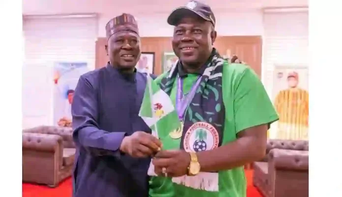 Governor Finitr and Super Falcons Coach