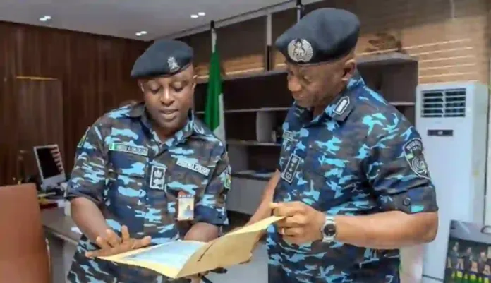 Anietie Iniedu and IGP Tunji Disu Anietie Iniedu and IGP Tunji Disu