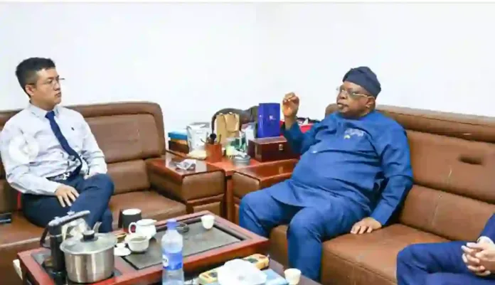 Dr Joseph Olasunkanmi Tegbe with HE Yu Dunhai