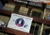 NDC Officials In Alimosho Raise Alarm Over Threat To Demolish Building Hoisting NDC Banner NDC Banner in Alimosho