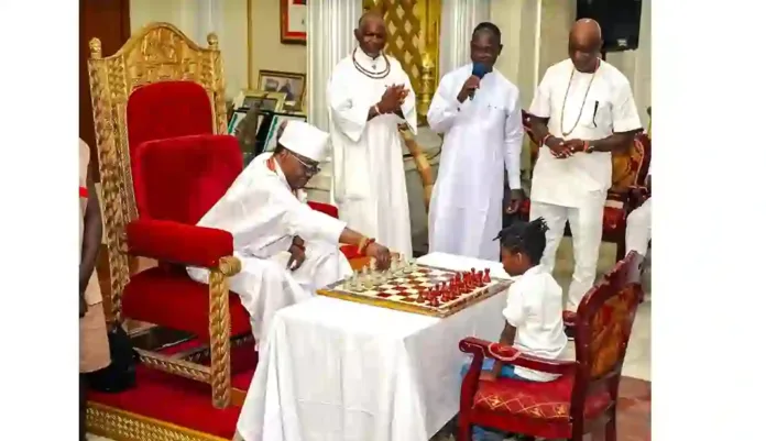 Oba of Benin with 8 Year Old Chess Player Oba of Benin with 8 Year Old Chess Player